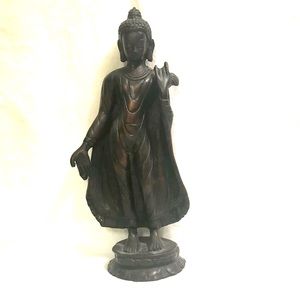 Siddhartha/Buddha Posing as a young Man with Robe.